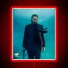 Neon glow of Keanu Reeves face in bold, colorful RGB lighting.