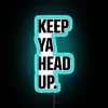 Eye-catching RGB neon signs with 'Keep Ya Head Up' motivational phrase.