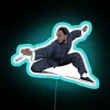 Kenny G's music meets Kung Fu culture in neon bliss