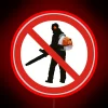 Neon Warning Sign Prohibits Leaf Blowing in Restricted Area Outside