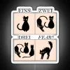 Learn German with whimsical feline friends under colorful neon lights.