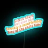 Philosophical Neon Sign Quote about Perceptions of Time as Both Brief Long
