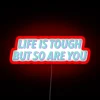 Motivational wall decor with glowing bold inspirational phrases in color.