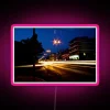 Vibrant LED canvas sign with dynamic colorful light trail effects
