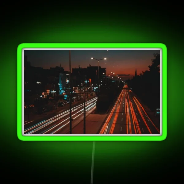 Long Exposure Of Busy Street RGB Neon Sign