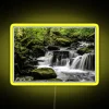 Vibrant LED waterfall display with dynamic colorful pixel lighting effects.