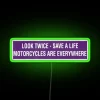 Eye-catching look twice save lives safety reminder rgb neon signage.