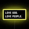 Black RGB neon sign with inspirational love and faith message