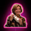 Luxurious Lucille Bluth sips vodka under vibrant RGB city lights