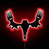 Neon meat eater skull decoration for bold kitchen or bar