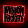 Vibrant Minion Factory Logo Illuminated in Bright Neon Rainbow Colors