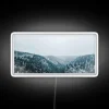 Neon-lit graphic led featuring vibrant Misty Mountain design elements.