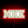 Neon sign featuring iconic MKE University font in vibrant colors