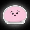 Vibrant Japanese-inspired mochi mascot in colorful neon lights isolated.