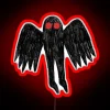 Mysterious winged creature illuminated in vibrant, glow-in-the-dark RGB neon lighting