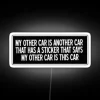Unique Neon Sign Featuring Quirky 'My Other Car' Humor Design.