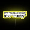 Personalized humorously honest office decor statement with colorful neon lighting.