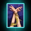 Neon lit wall decor featuring anime-inspired character's iconic tie design
