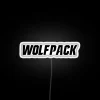 Vibrant NC State Wolfpack logo shines bright in colorful RGB light.