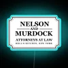 Bright neon Nelson and Murdock law firm logo retro sign