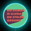 No human is illegal statement in vibrant RGB neon signage.