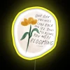 Vibrant RGB Neon Sign Featuring Blooming Floral Design Patterns Brightly Lit