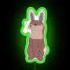 Whimsical ceramic home decor accent featuring cute rabbit neon art.