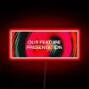 Eye-catching LED sign showcasing vibrant color-changing RGB technology at night.