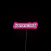 Phonetic stress relief in bold black and white neon letters.