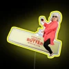 Paula Deen riding colorful butter on a vibrant neon background