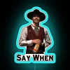 Vibrant neon whiskey sign featuring iconic Doc Holliday 'Say When' phrase