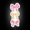 Add a pop of colorful fun with this preppy bow