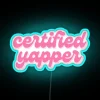 Eye-catching pink certified neon sign with vibrant RGB color accents.