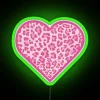 Vibrant pink cheetah print neon heart sign for modern decor spaces
