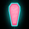 Vibrant pink coffin neon light decoration for bar or nightclub.
