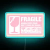 Vibrant Pink Fragile Warning Sign in Bright RGB Neon Lighting