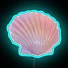 Vibrant pink seashell neon sign with colorful iridescent glow effect