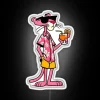 Pink Panther lounges on tropical beach under vibrant LED lights.