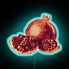 Vibrant pomegranate fruit symbolizes abundance and prosperity in vibrant glow.