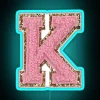 Neon Varsity Letter K Sign in Vibrant Pink Glowing Accents