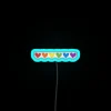 Vibrant pride rainbow hearts illuminated in colorful RGB neon glow