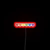 Vibrant LGBTQ+ pride symbol in colorful RGB neon heart accents.