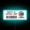 Vibrant 'Property of Capsule Corp' neon sign with colorful RGB lighting.