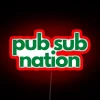 Neon lit bar decor with colorful Pub Sub Nation logo.