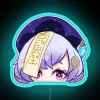 Glowing neon light-up display of QiQi from Genshin Impact game.