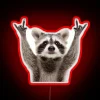 Hand-painted raccoon perched atop vibrant rock in bold RGB glow.
