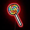 Vibrant rainbow lollipop pattern lit in bright RGB neon colors.