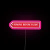 Aviation-themed led featuring 'REMOVE' before flight in bright neon accents.