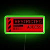 Authorized Access Only: Bright Red Restriction Sign with Neon Accent