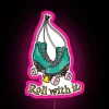 Vibrant Jade Green Neon Sign Rolling with Skates in Motion
